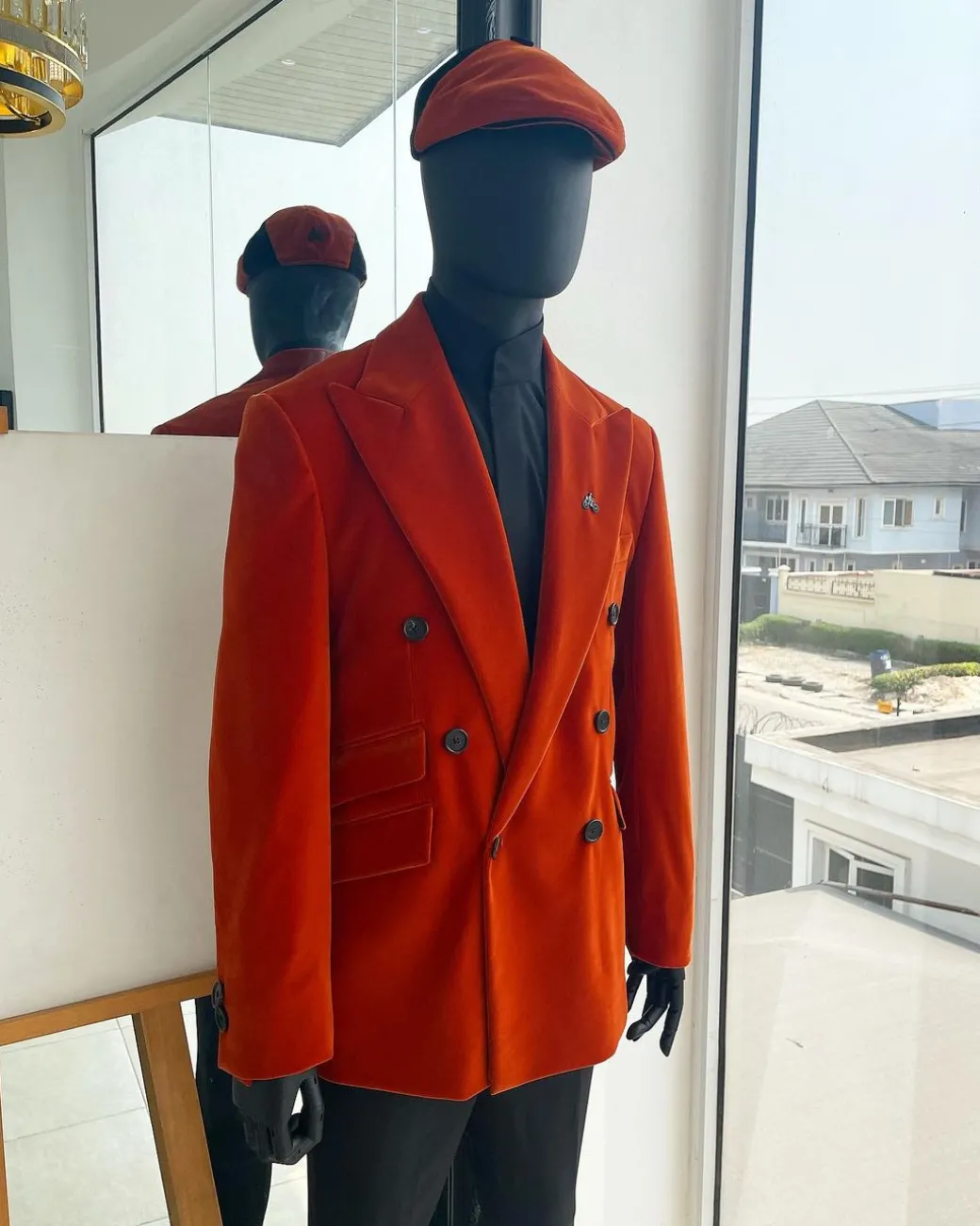 A vermillion Orange, soaked Italian velvet, double breasted, Lower Cut suit