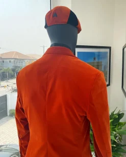 A vermillion Orange, soaked Italian velvet, double breasted, Lower Cut suit