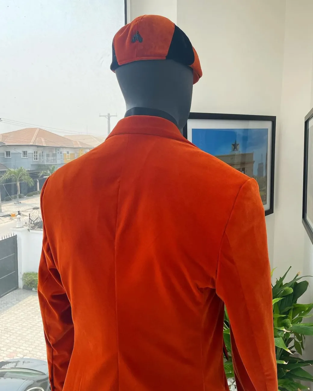 A vermillion Orange, soaked Italian velvet, double breasted, Lower Cut suit