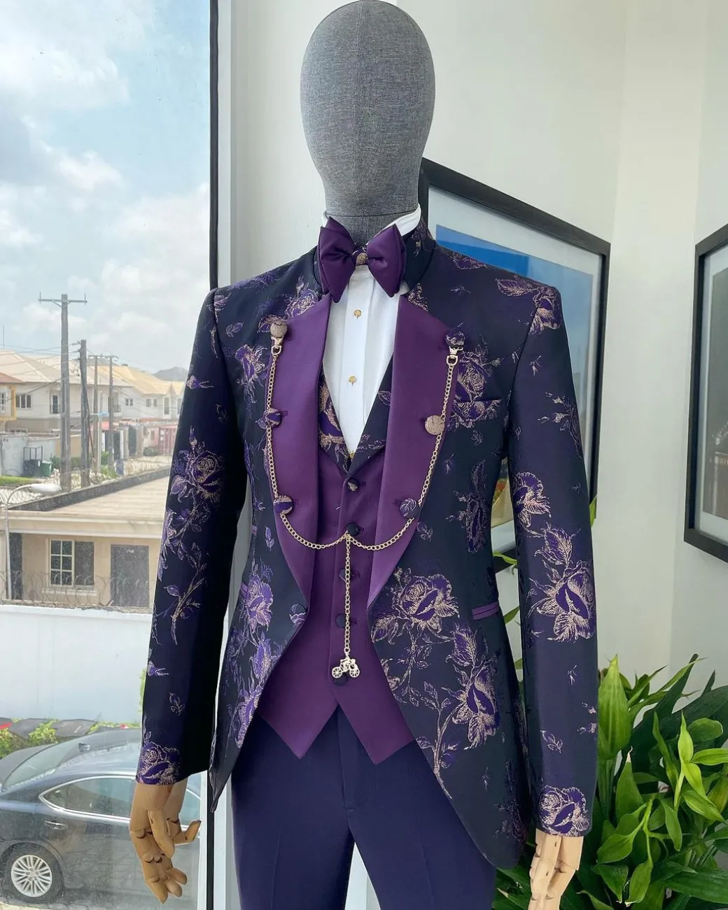 A “Vicar” Eggplant purple with a splash of gold floral metallic jacquard tuxedo suit