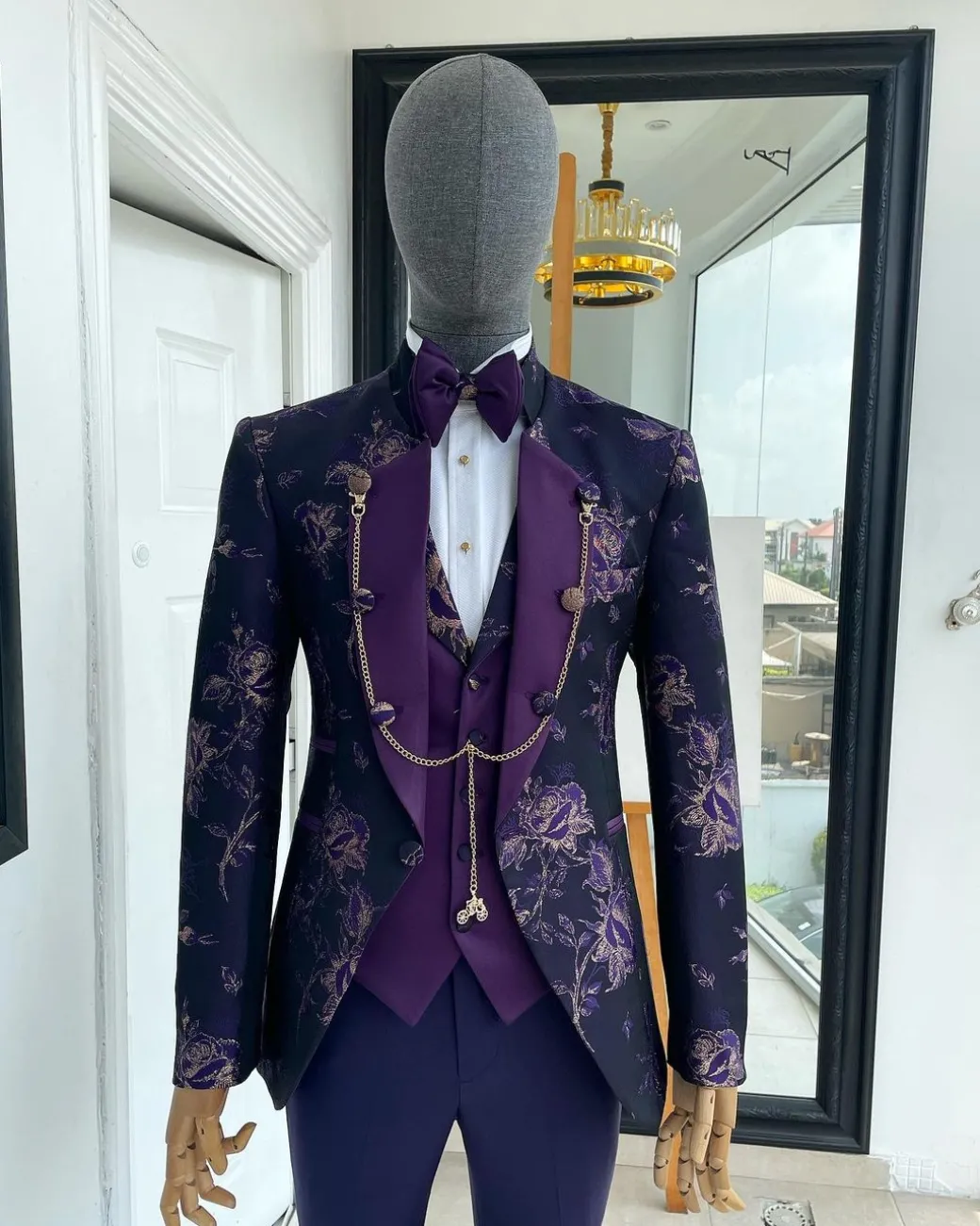 A “Vicar” Eggplant purple with a splash of gold floral metallic jacquard tuxedo suit