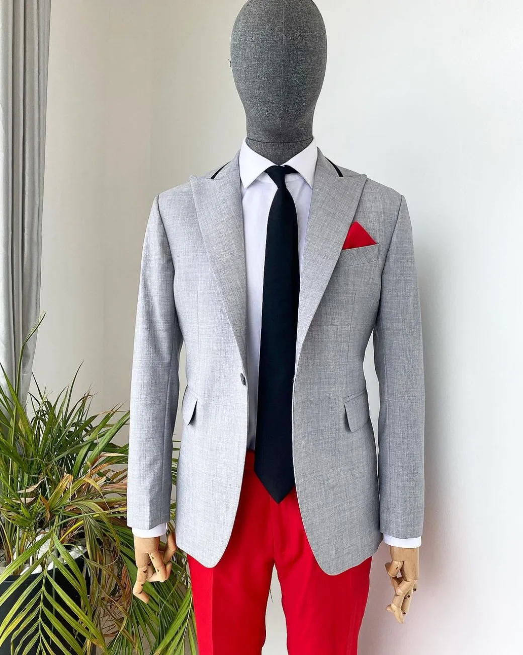 A “Whatever” Irish grey peak lapel with black stripe neck 1 button suit