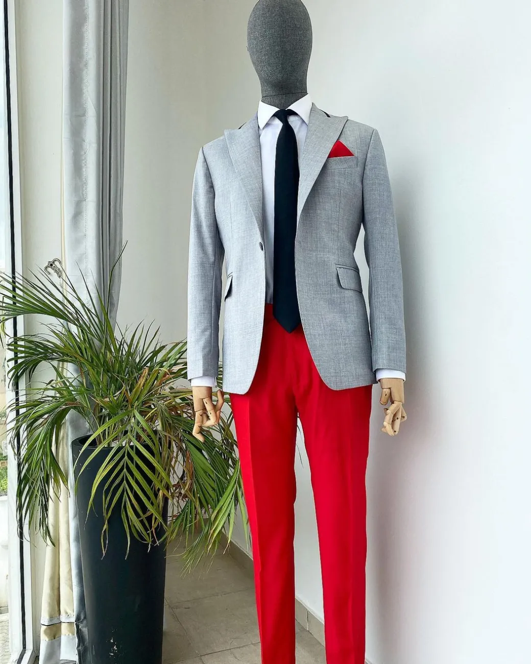 A “Whatever” Irish grey peak lapel with black stripe neck 1 button suit
