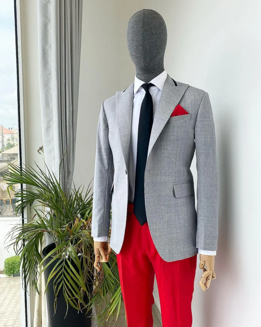 A “Whatever” Irish grey peak lapel with black stripe neck 1 button suit