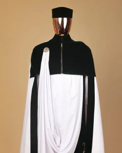 A white & green “independence” tragbada, zipline cape