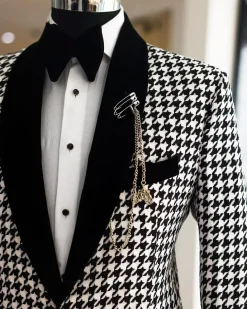 A White and black houndstooth, velvet shawl lapel tuxedo suit