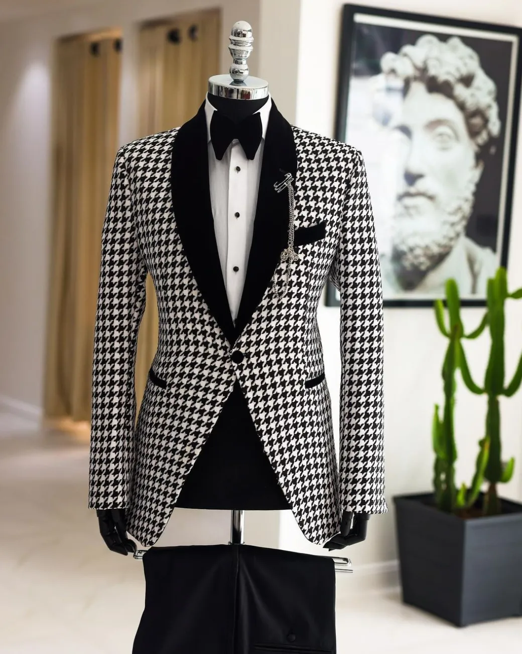 A White and black houndstooth, velvet shawl lapel tuxedo suit