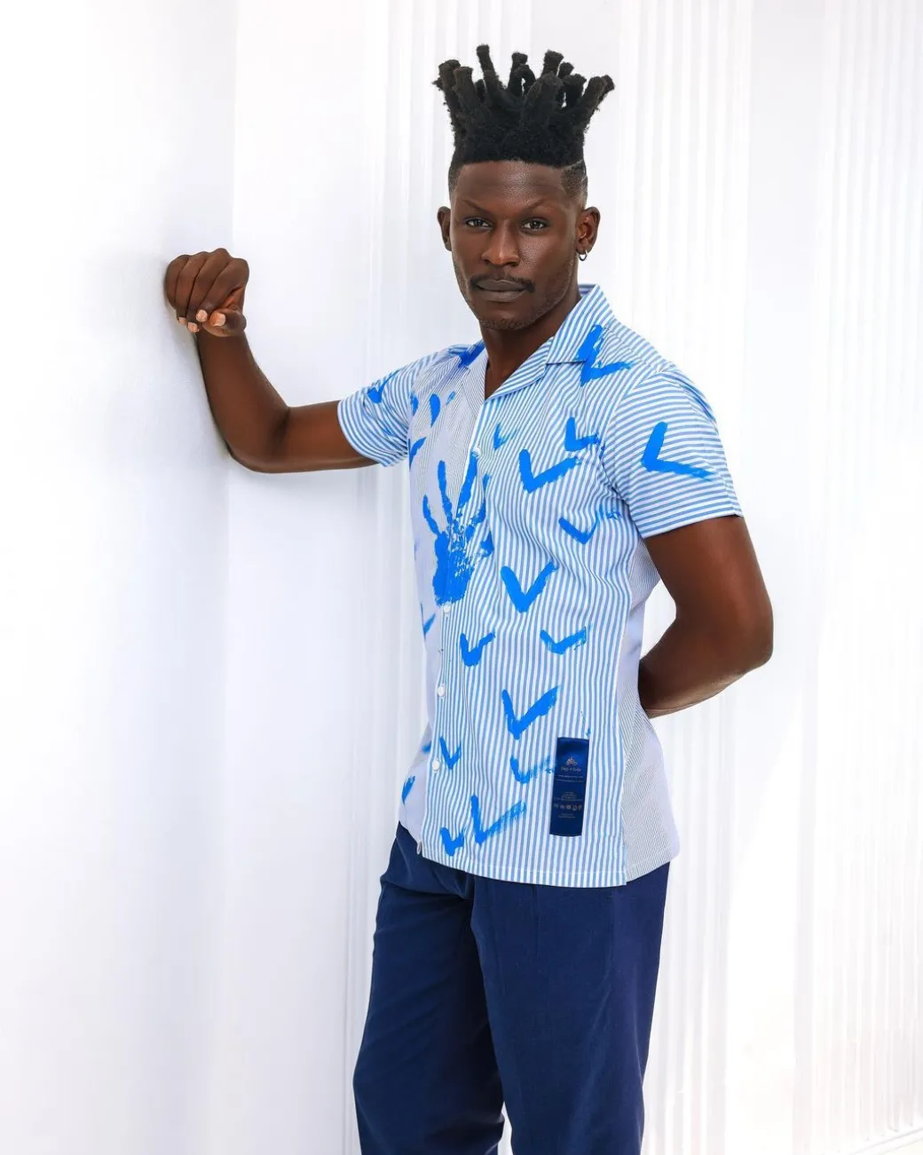 A White And Blue Mixed Hand Pattern Paint Stripe Shirt.