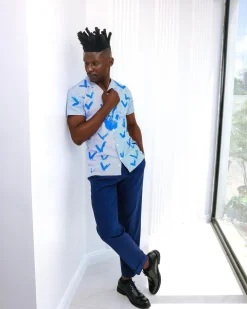 A White And Blue Mixed Hand Pattern Paint Stripe Shirt.