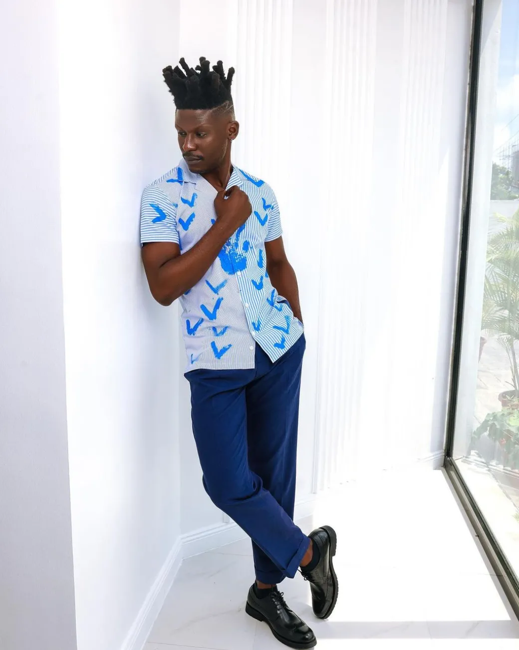 A White And Blue Mixed Hand Pattern Paint Stripe Shirt.