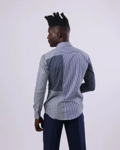 A White And Blue Mixed Stripe Shirt.