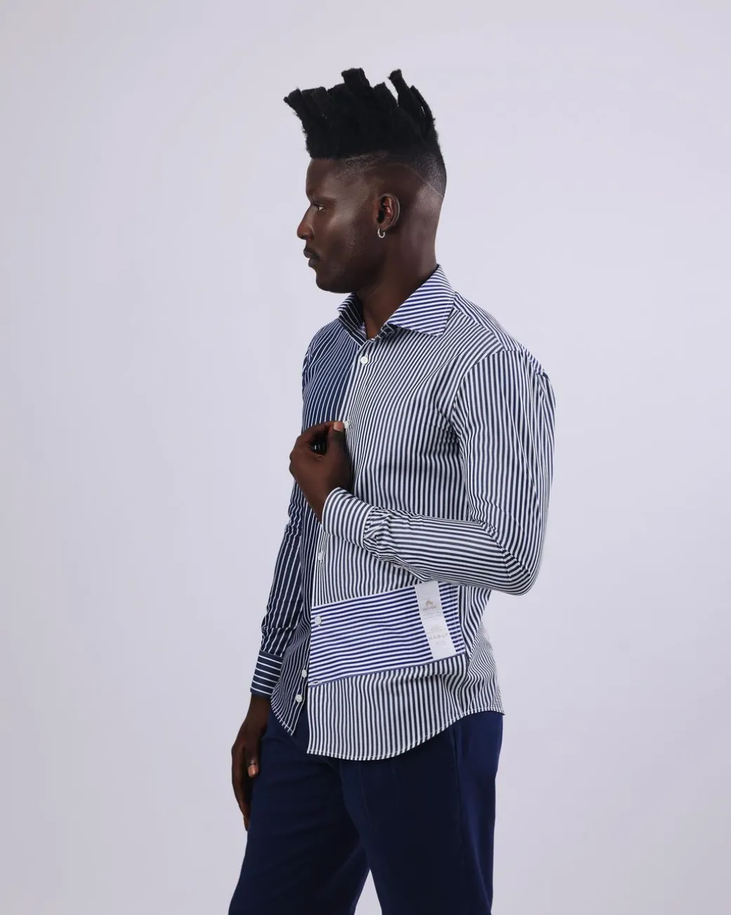 A White And Blue Mixed Stripe Shirt.