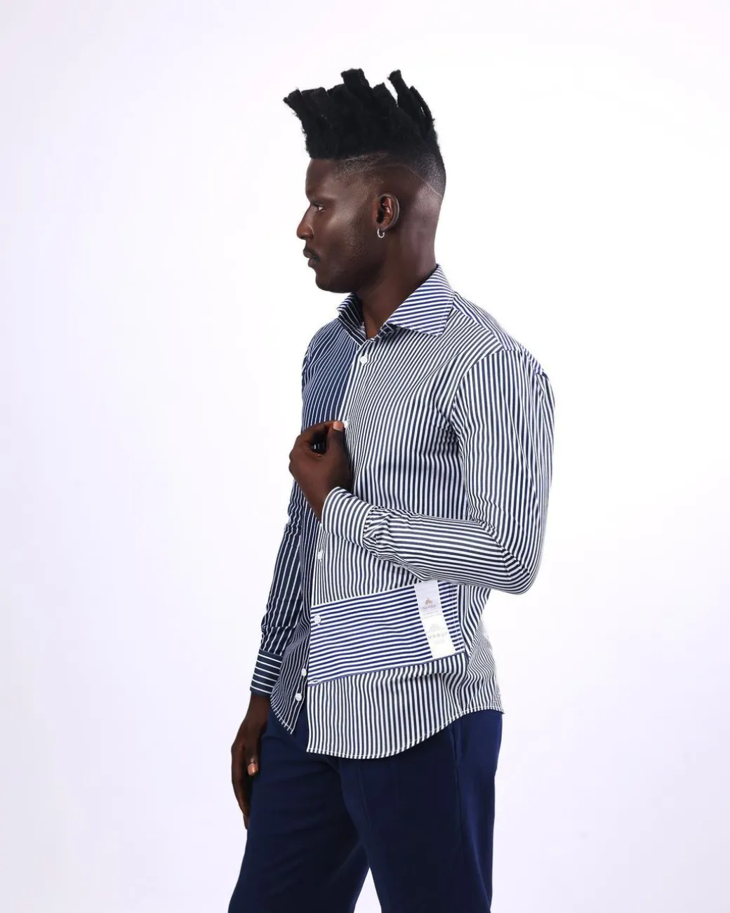 A White And Blue Mixed Stripe Shirt.