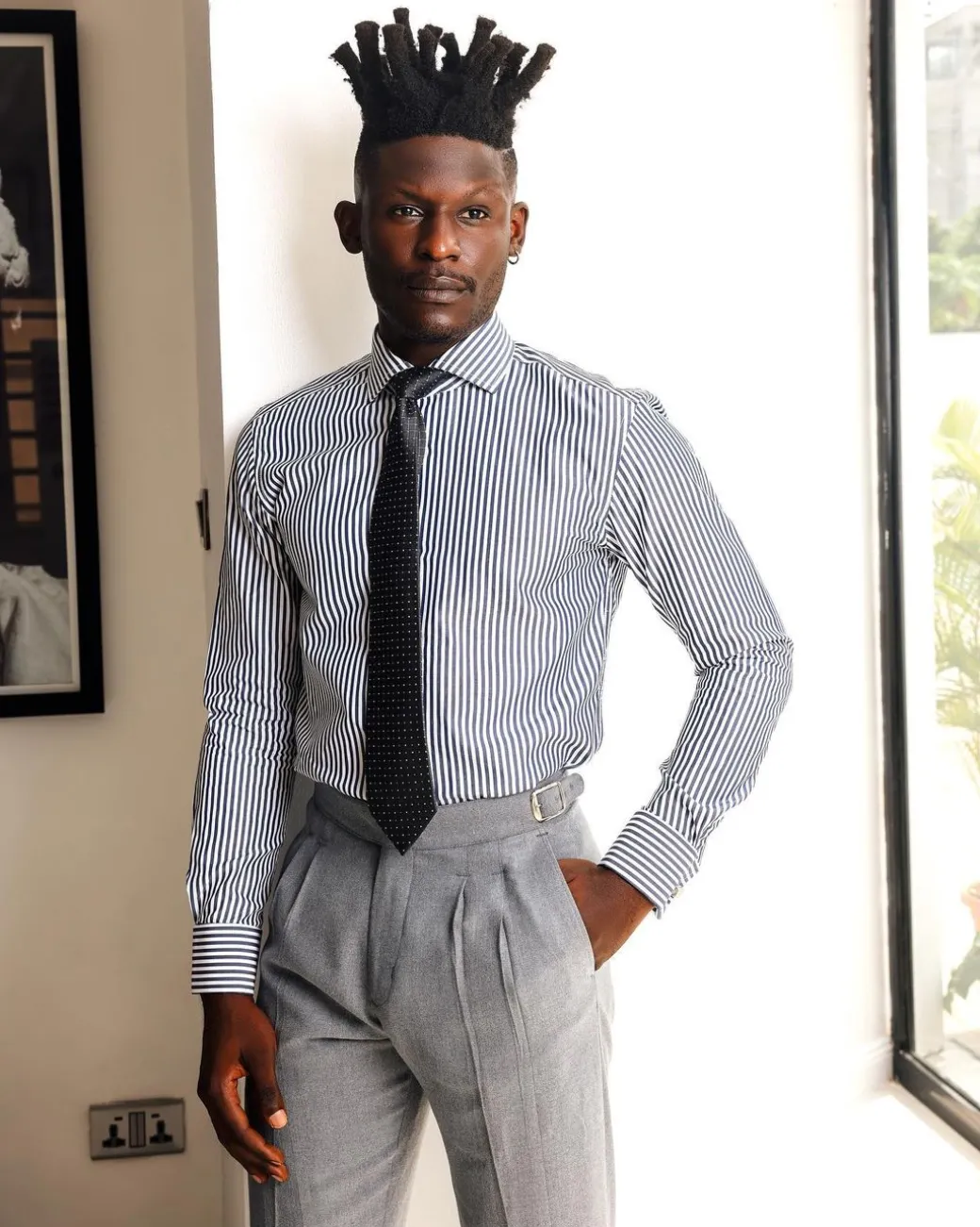 A White and blue stripe, cut-away collar business shirt.