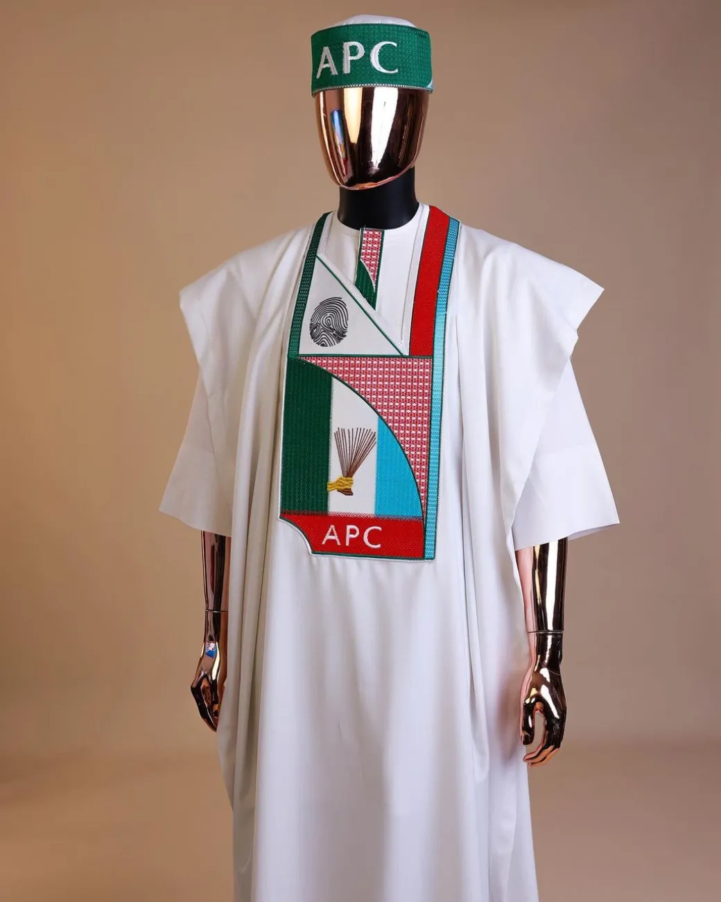 A White ,APC ( All Progressive Congress) pattern embroidery agbada
