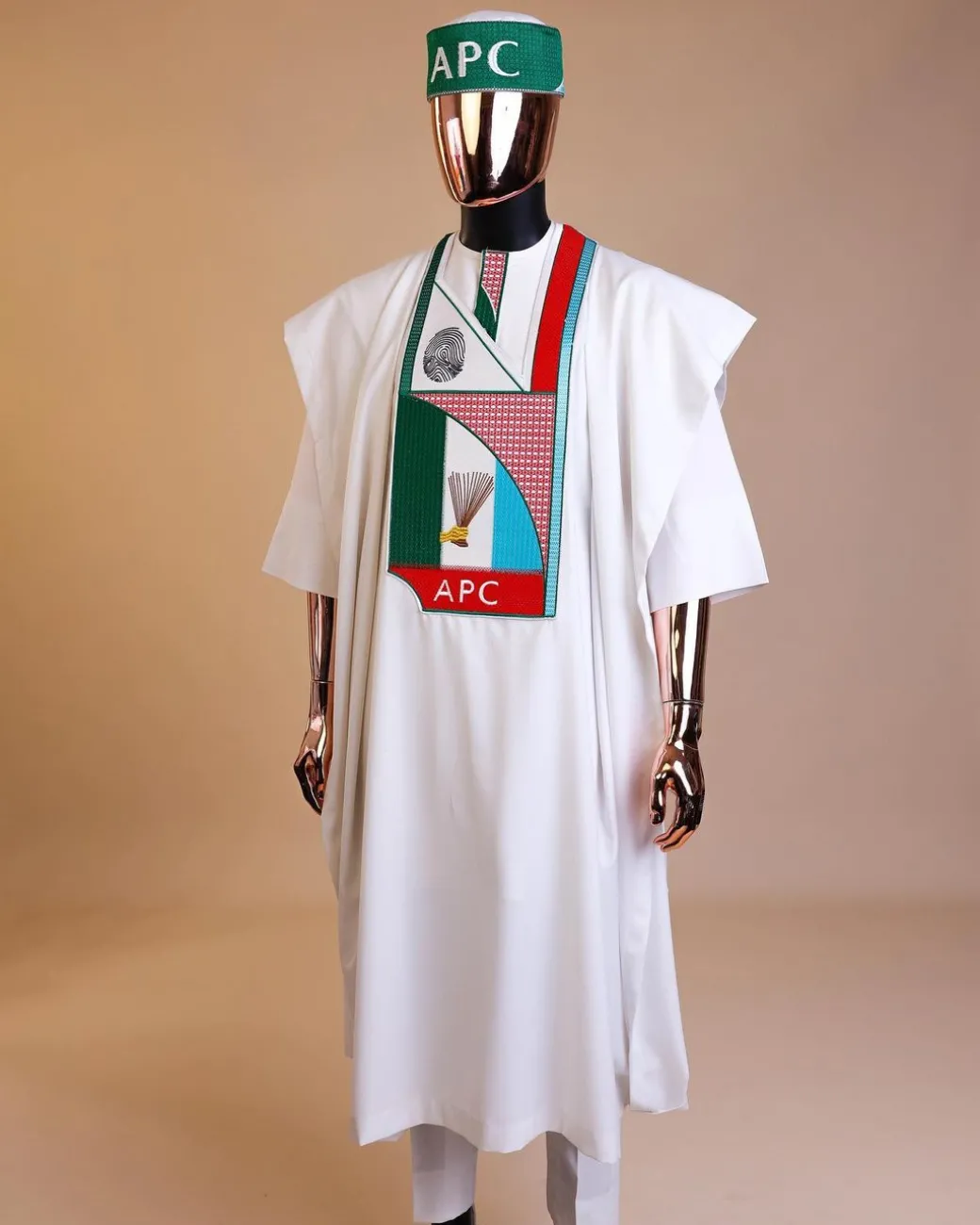 A White ,APC ( All Progressive Congress) pattern embroidery agbada