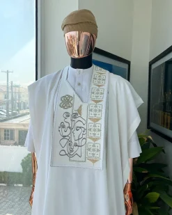 A white, connected faces renaissance maze embroidery details agbada