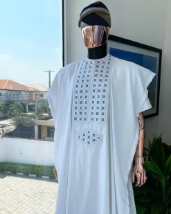 A white, connected square embroidery design with skye blue detailing Swarovski stone details agbada