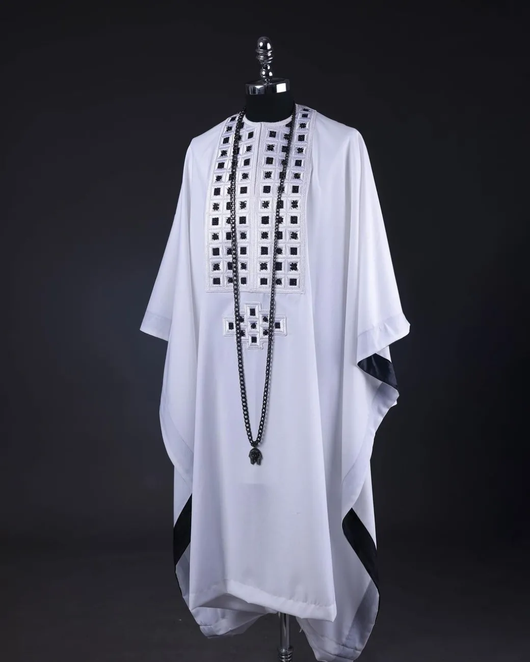 A White, Connected Square Embroidery Design With Matching Black And Silver Swarovski Stone Details Agbada