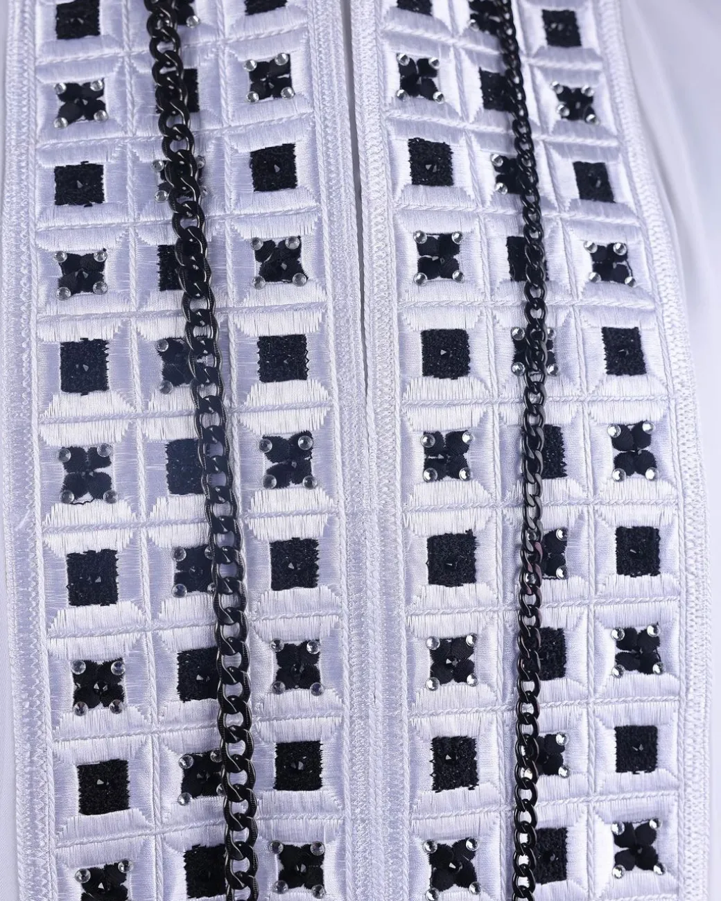 A White, Connected Square Embroidery Design With Matching Black And Silver Swarovski Stone Details Agbada