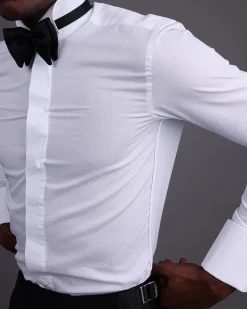 A White, covered button, connected paisley print wing collar tuxedo shirt.