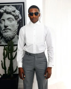 A White, Cut-Away Pleated Evening Tuxedo Shirt.