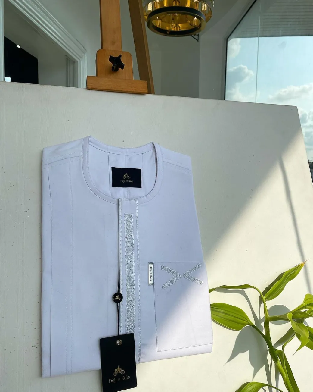 A white, dotted and covered square embroidery detailing african traditional senator kaftan native.