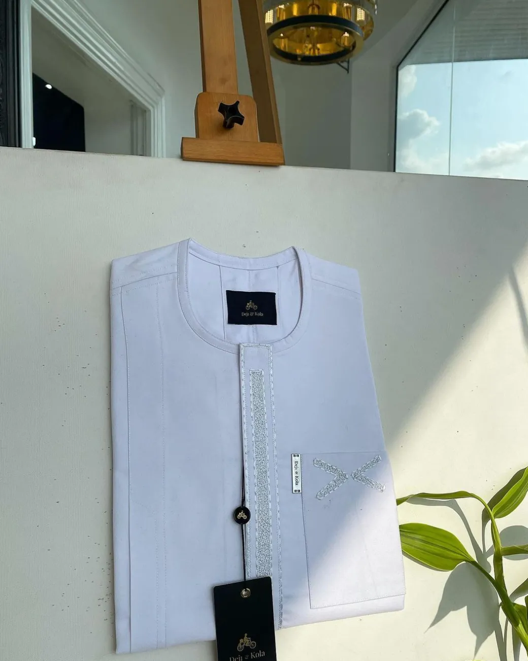 A white, dotted and covered square embroidery detailing african traditional senator kaftan native.
