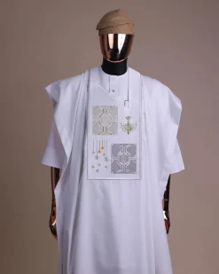 A white, dripping stars and interconnected maze embroidery details agbada