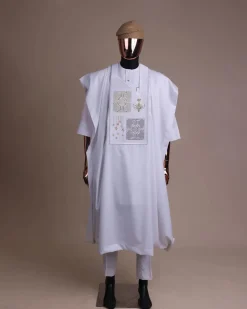 A white, dripping stars and interconnected maze embroidery details agbada