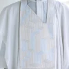 A White, dropping maze line embroidery details agbada, 3/4 sleeve kaftan, and Sokoto