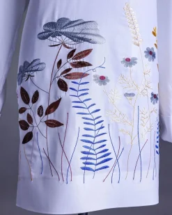 A White, front flap, floral petals, blue Swarovski buttons, long sleeve embroidery detail African senator Kaftan