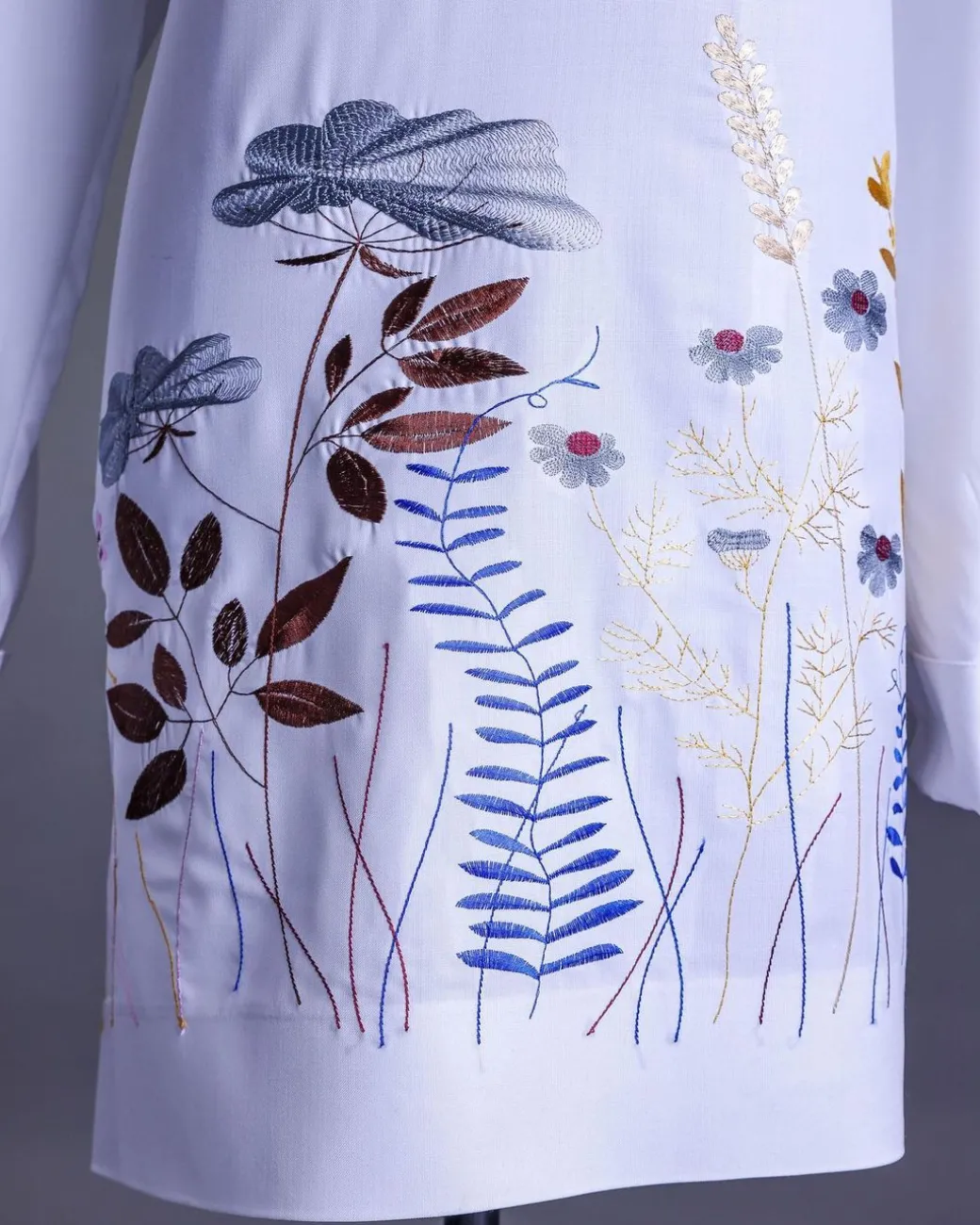 A White, front flap, floral petals, blue Swarovski buttons, long sleeve embroidery detail African senator Kaftan