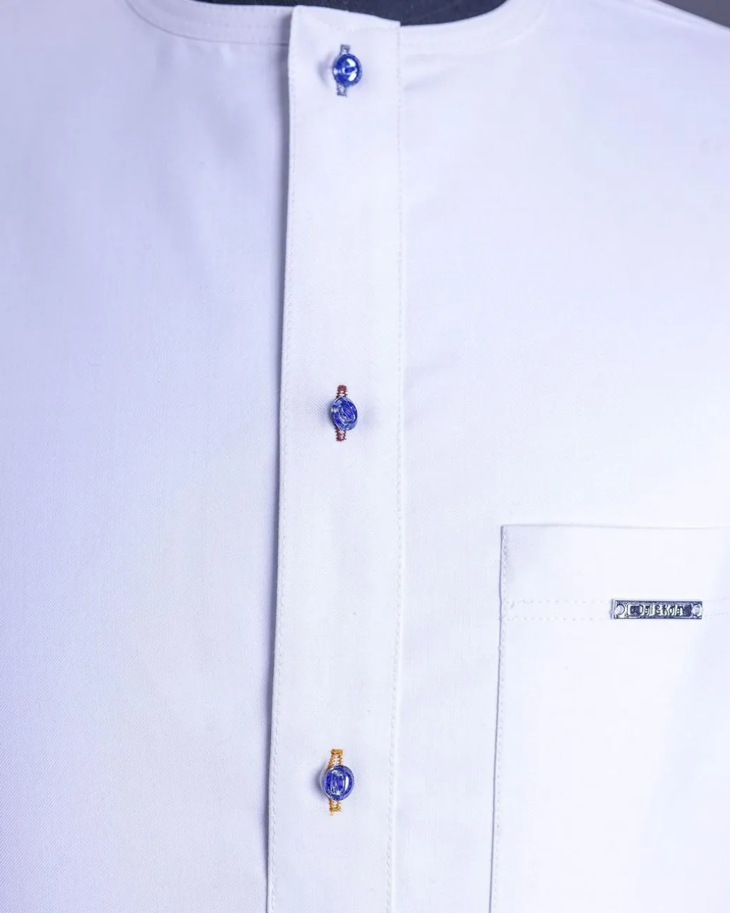 A White, front flap, floral petals, blue Swarovski buttons, long sleeve embroidery detail African senator Kaftan