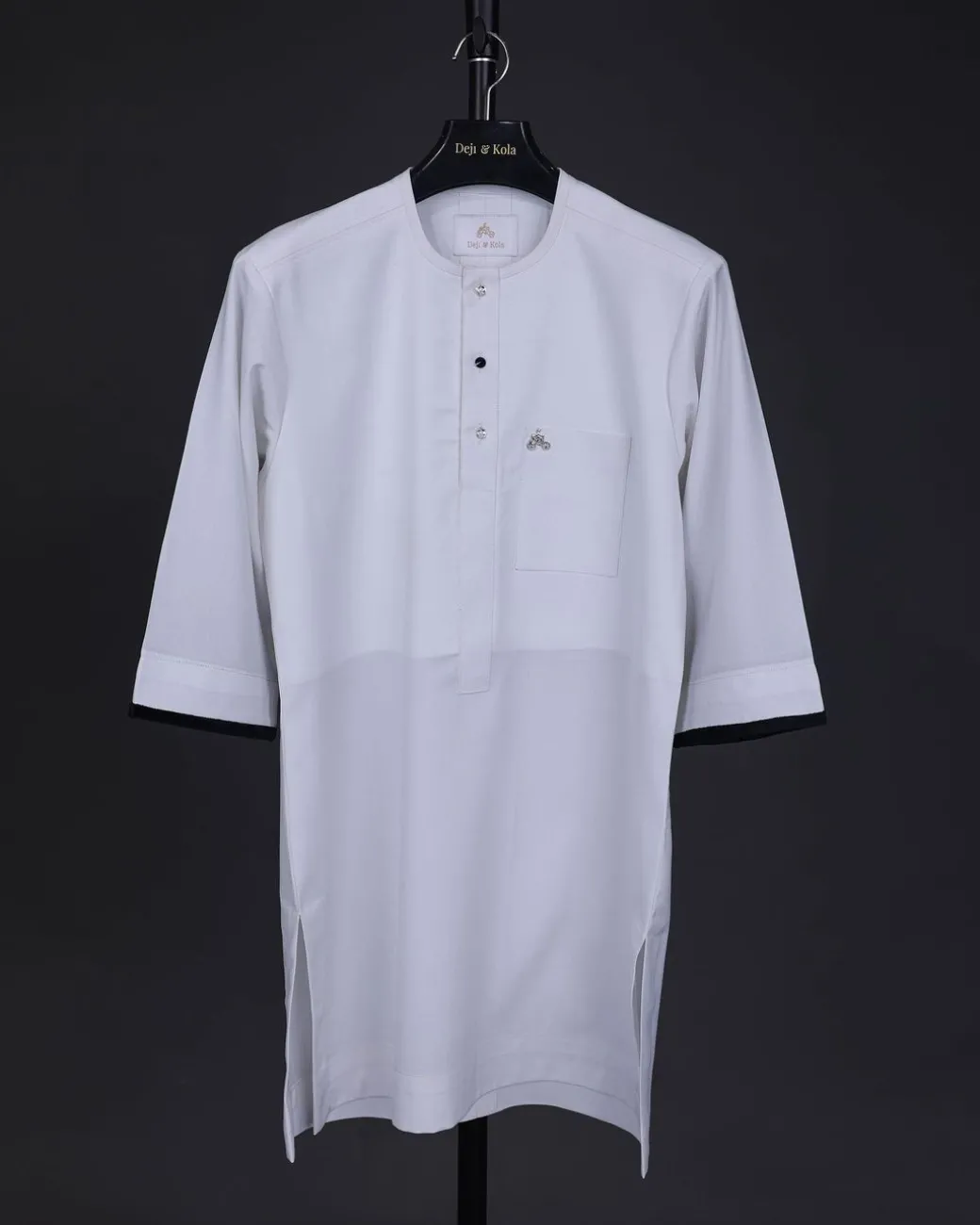 A white, front flap with mixed Swarovski button,3/4 sleeve with velvet cuff details African senator kaftan Native.
