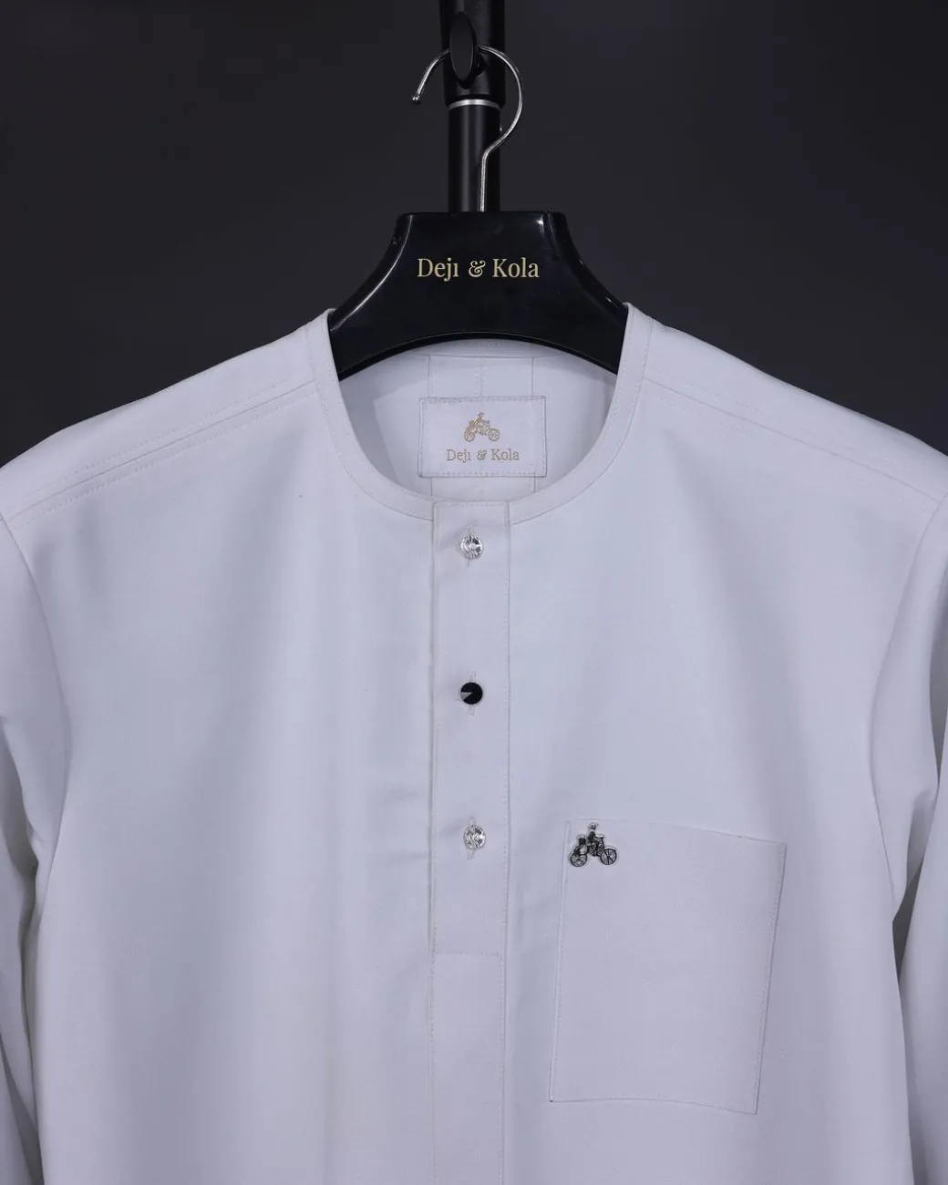 A white, front flap with mixed Swarovski button,3/4 sleeve with velvet cuff details African senator kaftan Native.