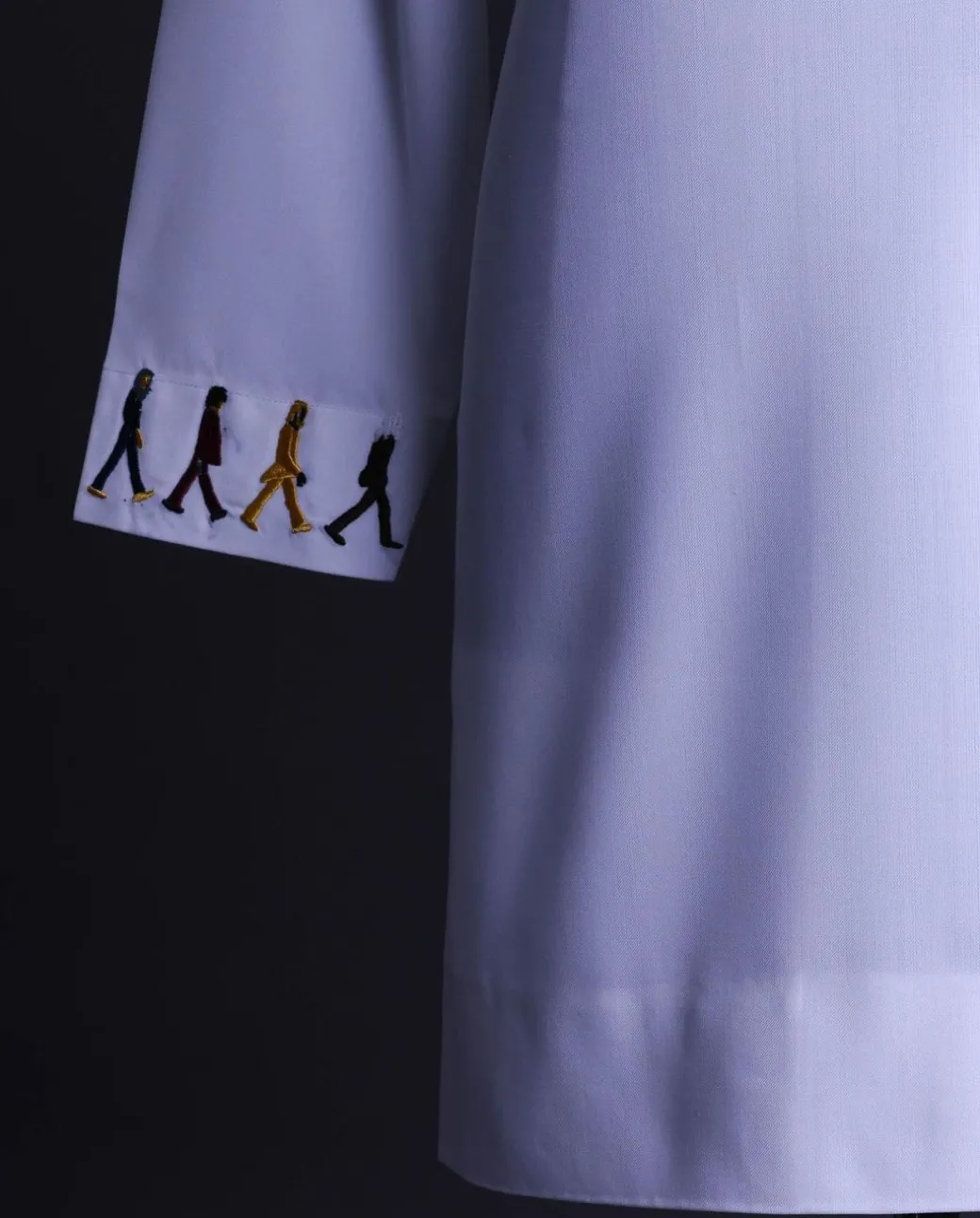 A White, front flap with mixed Swarovski buttons, patch pocket, free hand cuff with (keep walking) embroidery detailing African senator kaftan native.