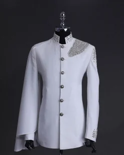 A white, hand “ide” silver metal wire embroidery, right hand sache safari suit