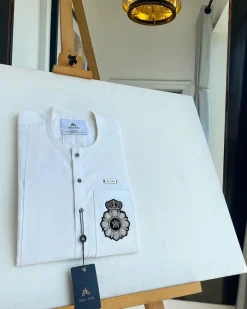 A White, patch pocket, front flap with clear view jet black Swarovski button details African kaftan