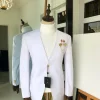 A White “Polaris” lapeless one button tuxedo Suit