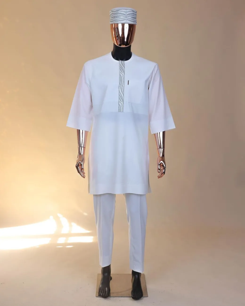A White, roaring tiger metallic wire embroidery details Agbada