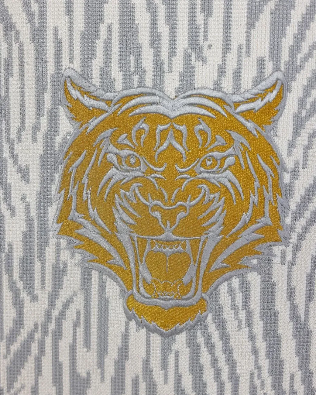 A White, roaring tiger metallic wire embroidery details Agbada