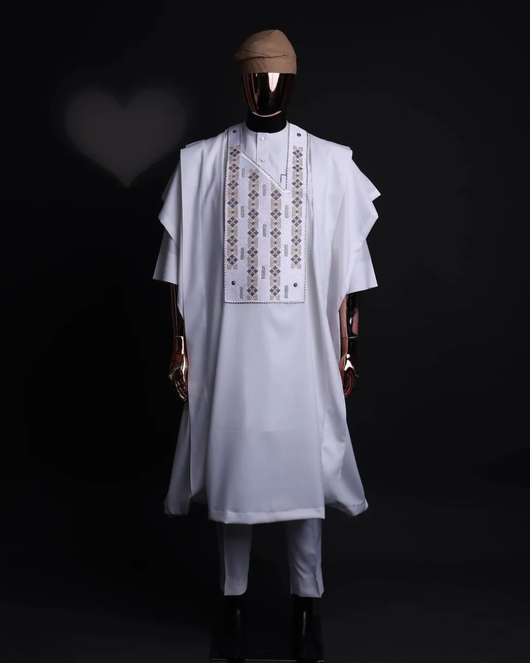 A white, shattered interwoven embroidery with Swarovski stones details agbada