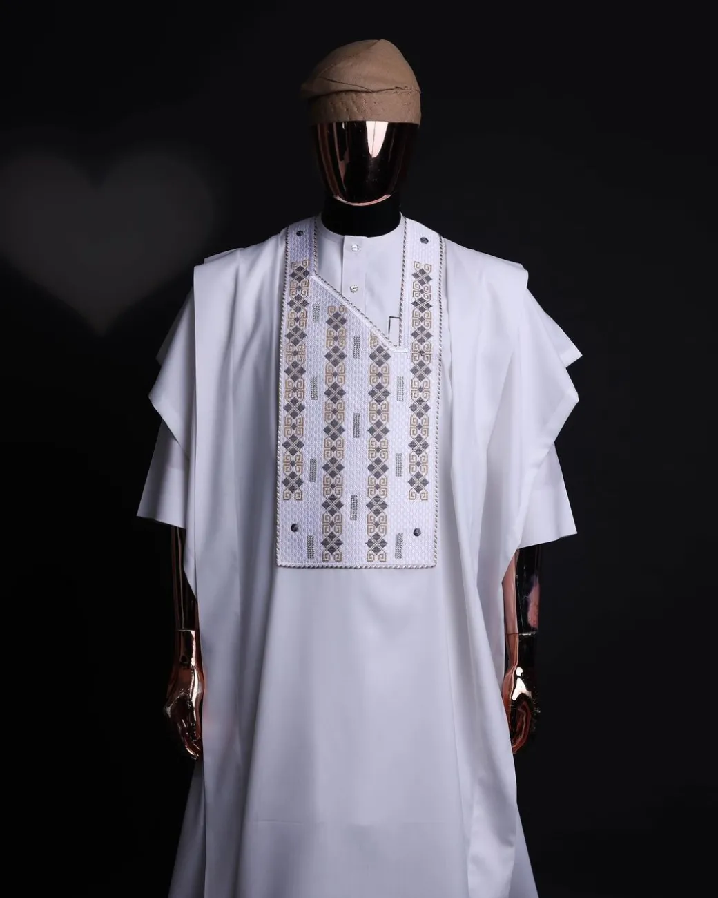 A white, shattered interwoven embroidery with Swarovski stones details agbada