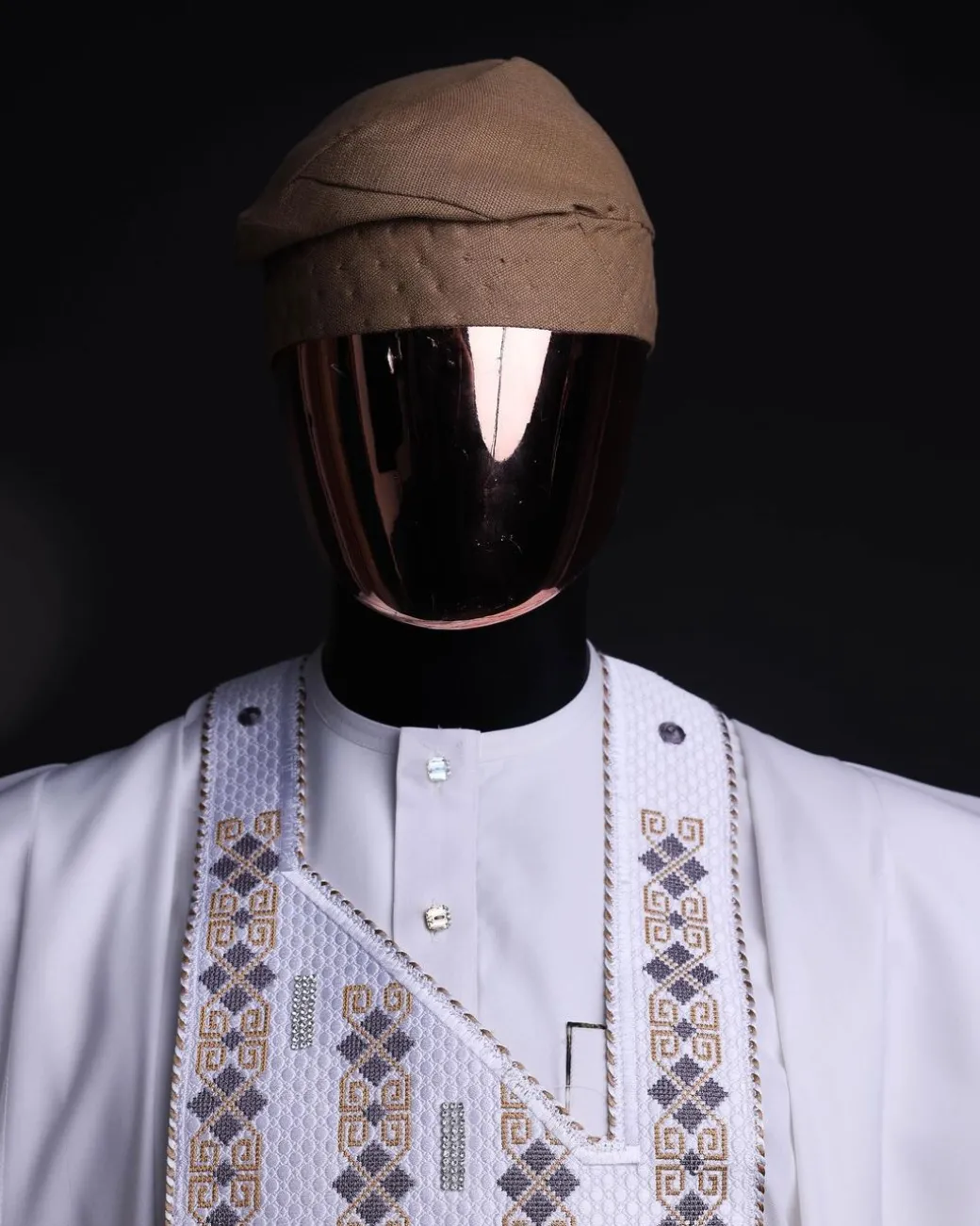 A white, shattered interwoven embroidery with Swarovski stones details agbada