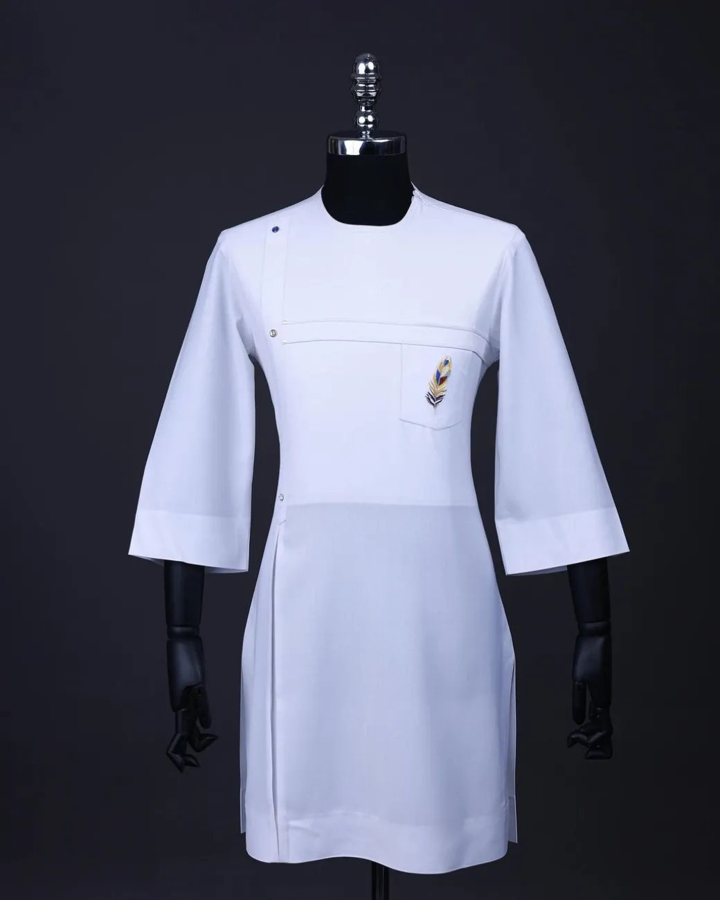 A White T shaped line with Swarovski buttons, leaf embroidery patch pocket, 3/4 sleeve African senator kaftan native.