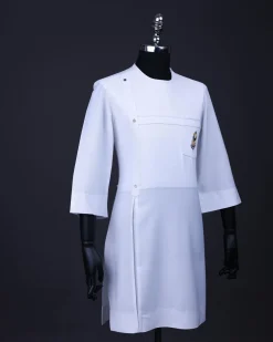 A White T shaped line with Swarovski buttons, leaf embroidery patch pocket, 3/4 sleeve African senator kaftan native.