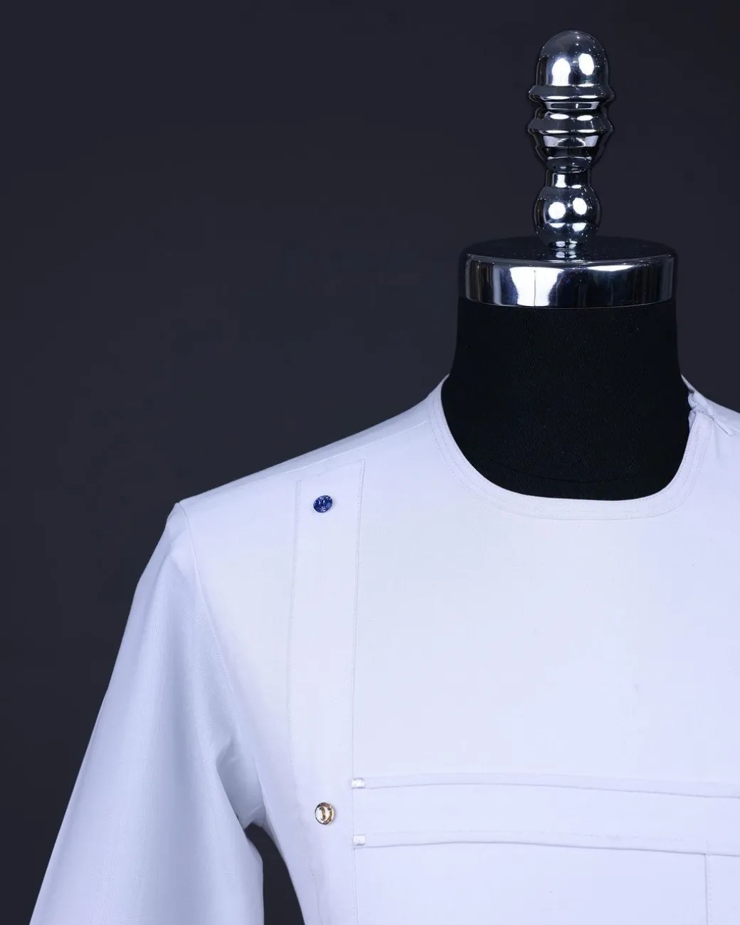 A White T shaped line with Swarovski buttons, leaf embroidery patch pocket, 3/4 sleeve African senator kaftan native.