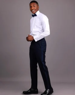 A White, Tuxedo Shirt With Dotted Front Details.