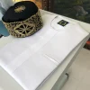 A White with a front-flap traditional African Kaftan and sokoto